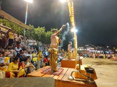 priest performing Ganga Aarti at Assi Ghat in evening